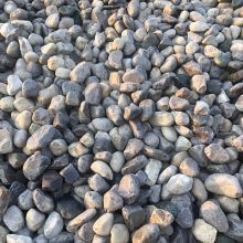 O Stone<br>Round stone primarily 4” in size.  Used for drainage and landscaping purposes.
